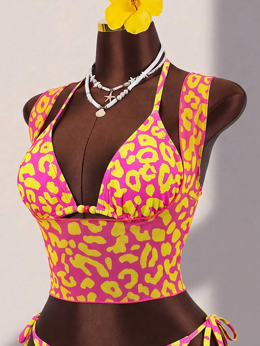 Brown striped 3-piece bikini set for women featuring a halter tie neck, wireless triangle cups with removable padding, cut-out details, and low waist tie side bottoms.