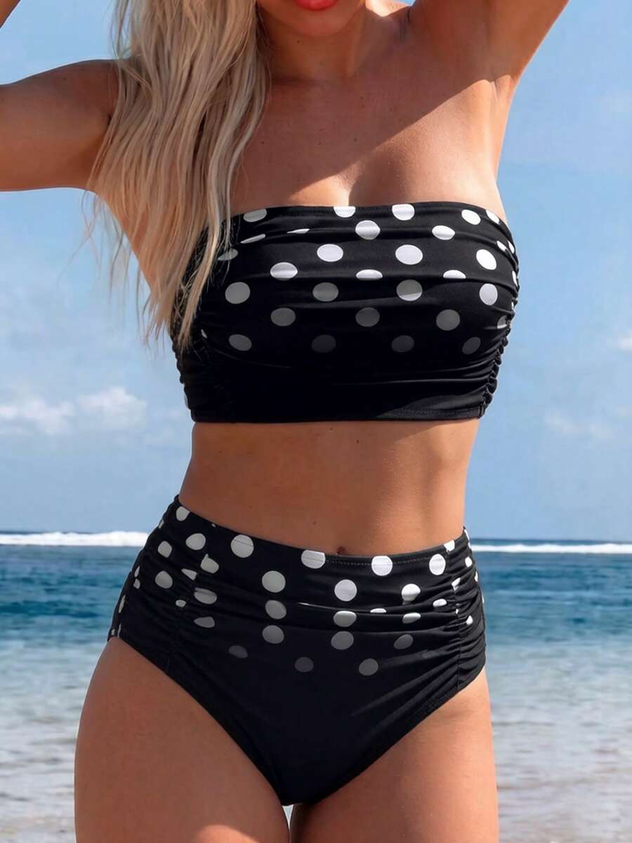 Women's black strapless ruched bandeau bikini top with high waisted bottoms