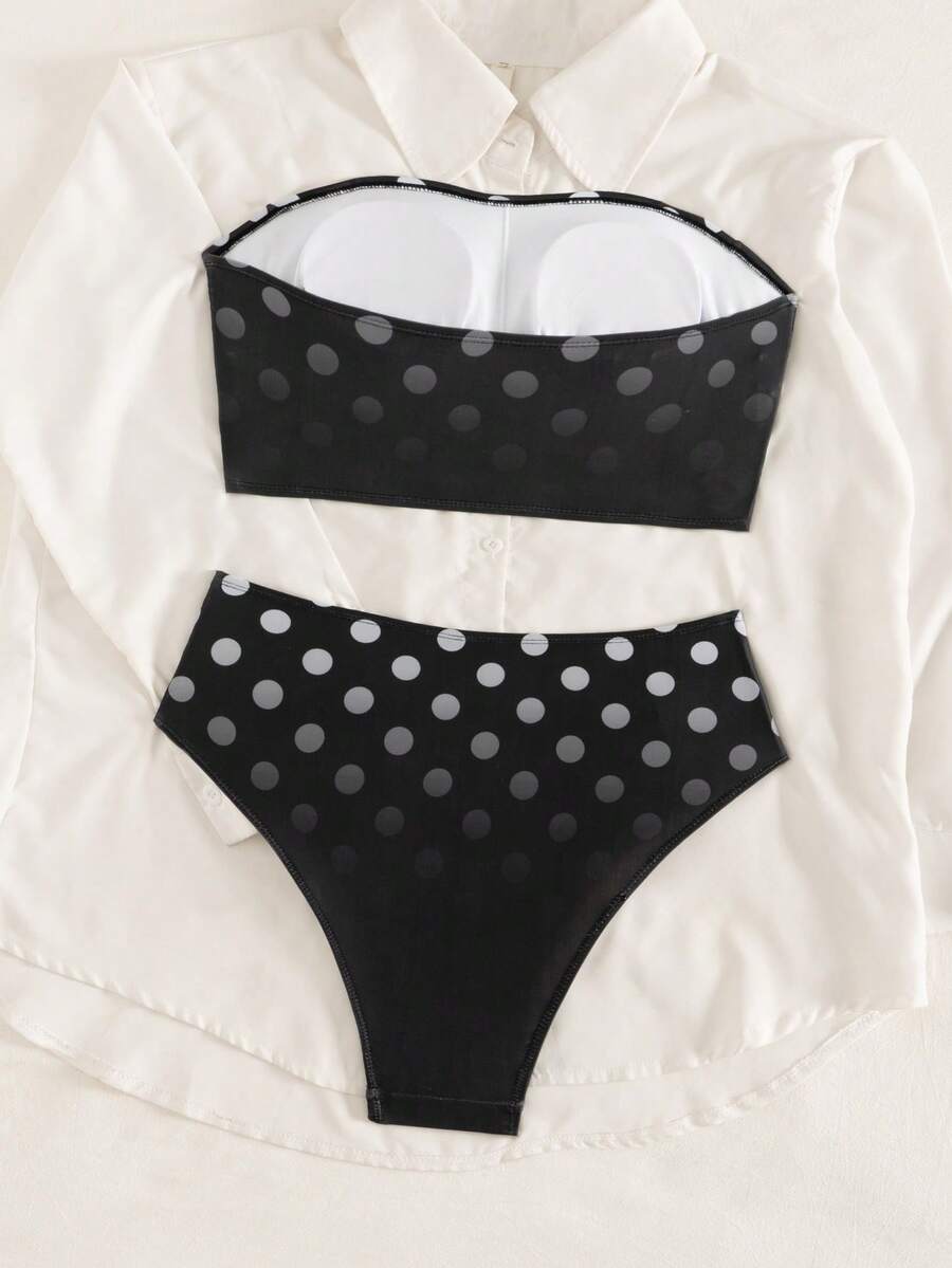 Women's black strapless ruched bandeau bikini top with high waisted bottoms