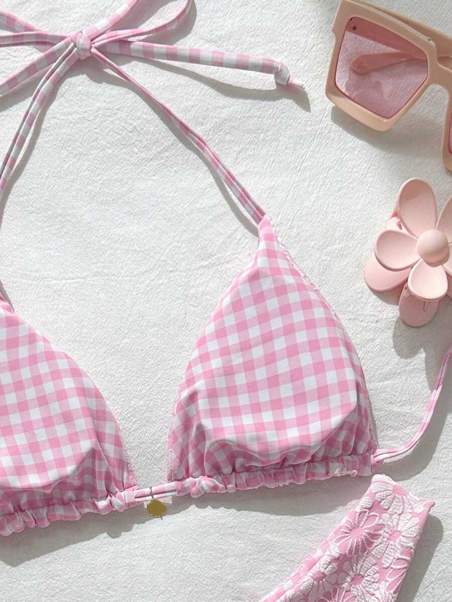 Women's black textured plaid 2-piece bikini set featuring a halter neckline, wireless triangle cups with removable padding, and mid-waist bottoms.