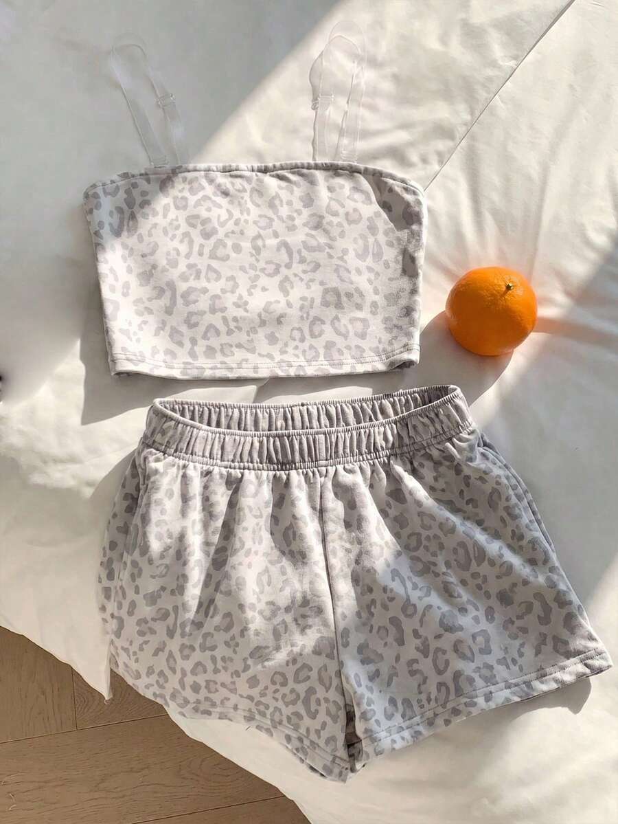 Tween girls two-piece summer outfit featuring a brown strapless tube top with contrast pink tape accent and matching brown shorts with pockets.