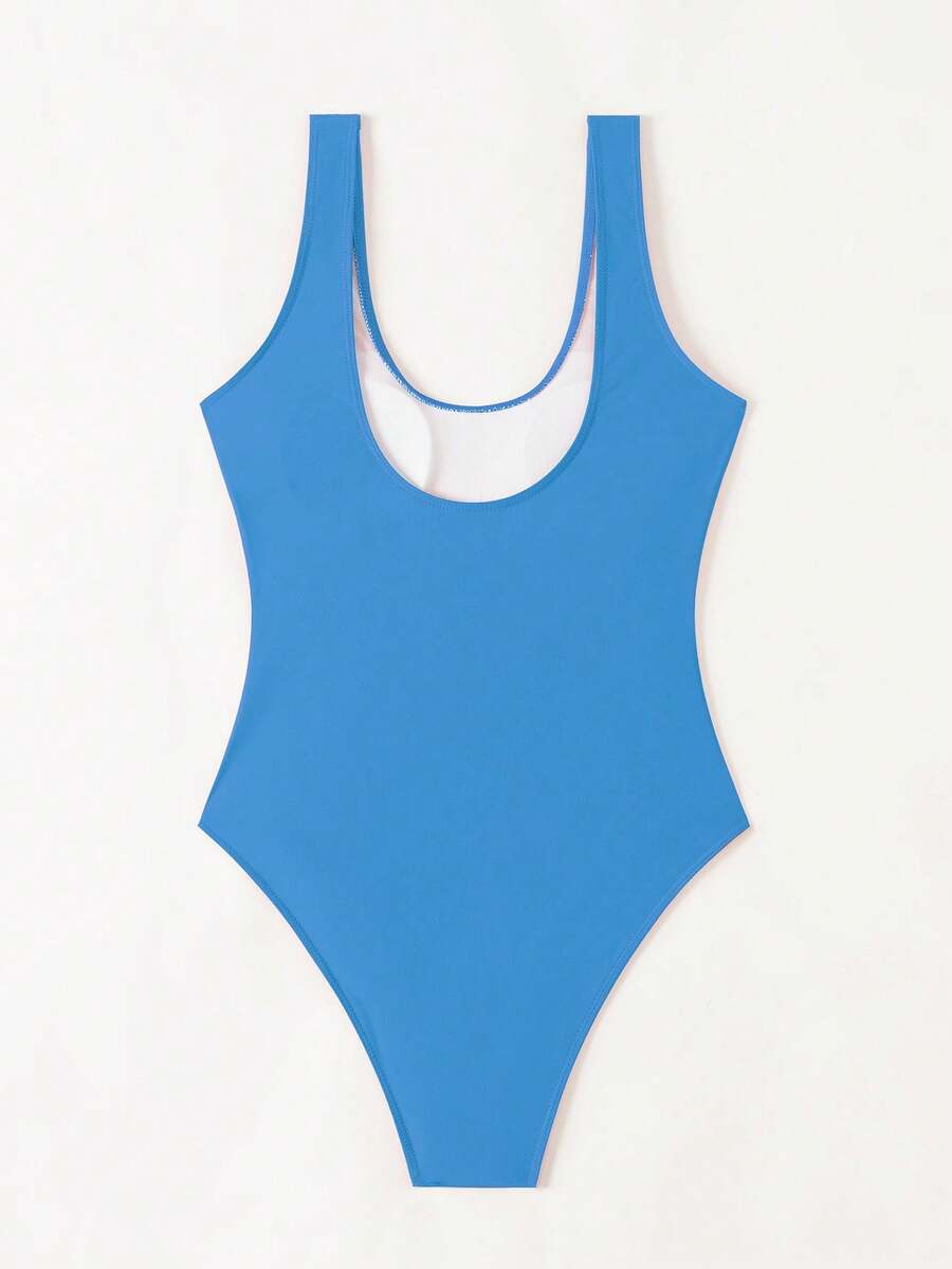 Women's solid color one-piece swimsuit featuring a backless scoop neck design and high cut fit