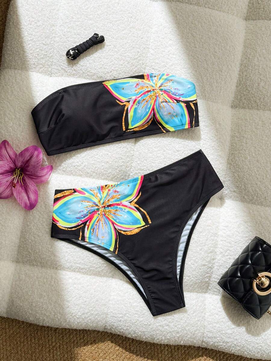 Women's black two-piece bandeau bikini set featuring high waist bottoms, backless buckle closure, and removable padding.