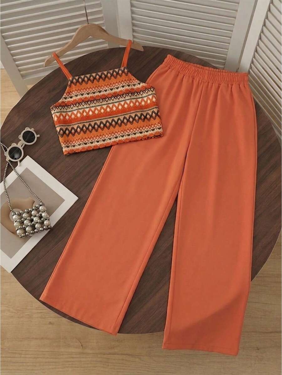 Tween girls casual 2-piece set featuring an apricot woven camisole crop top with back shirring and matching high-waisted loose long pants.