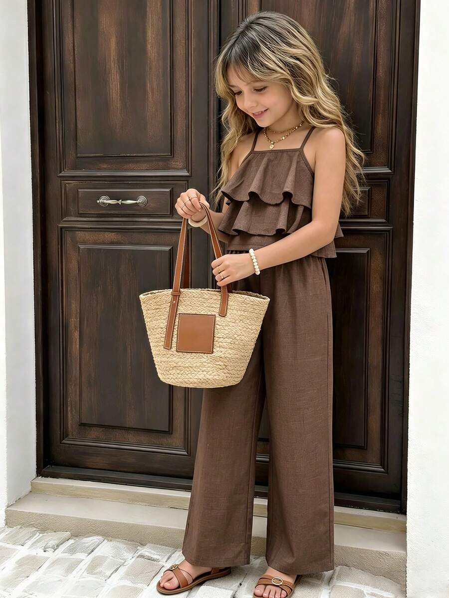 Tween girls blue 2-piece vacation outfit set featuring a tiered ruffle spaghetti strap camisole and loose high-waist pants.