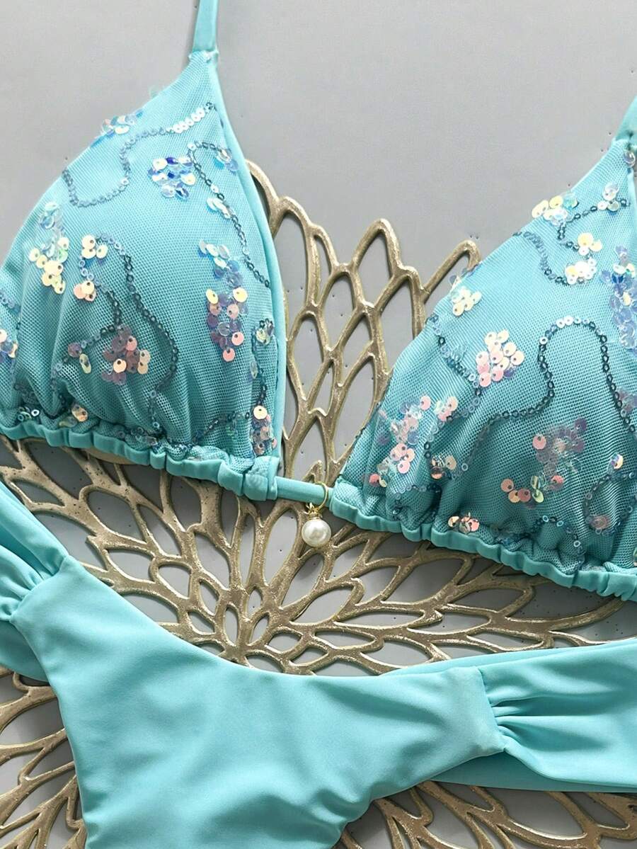 Women's 2-piece triangle cup bikini set in solid color featuring woven pearl shell decoration, halter neckline, and high-waist side-tie ruched bottoms.