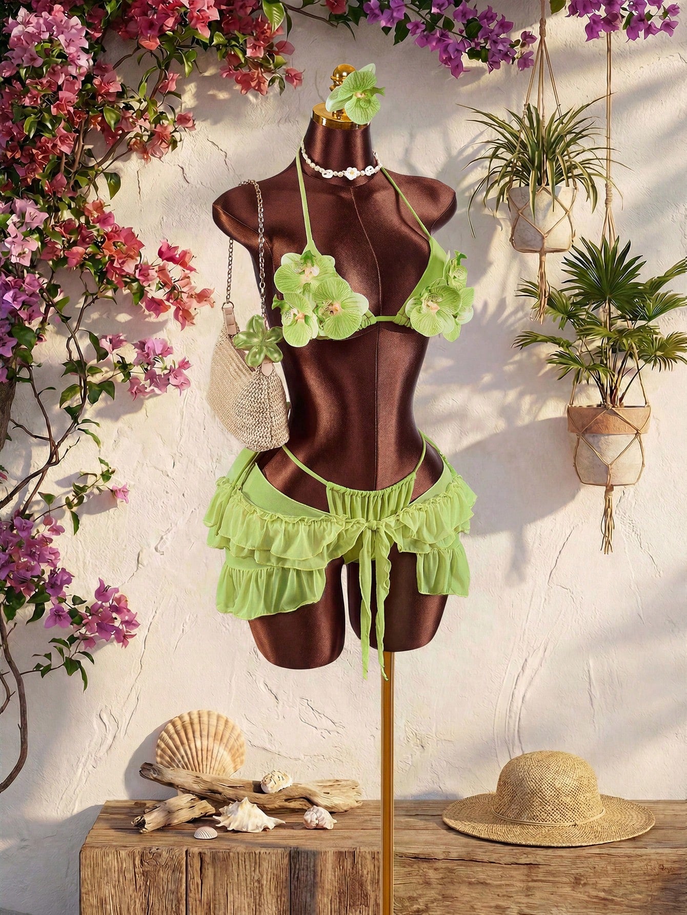 Women's 3-piece blue bikini swimwear set featuring a crop top with 3D rose accents, tie back detail, spaghetti straps, and tie-side bottoms.