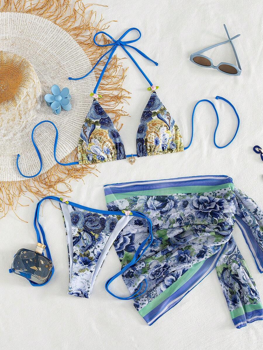 Women's 3-piece pink floral print bikini set featuring a wireless halter top with removable padding and matching tie-side swim bottoms.