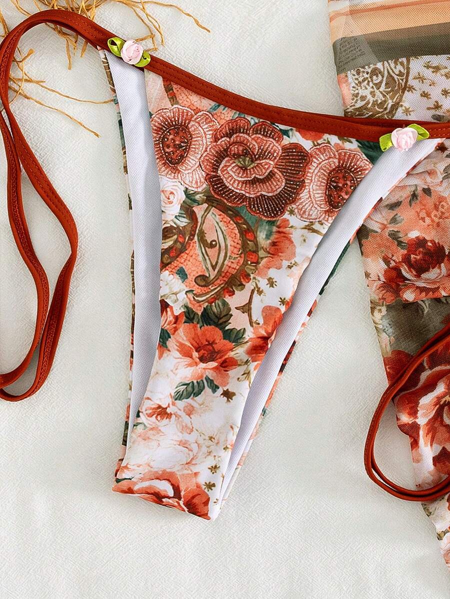 Women's 3-piece pink floral print bikini set featuring a wireless halter top with removable padding and matching tie-side swim bottoms.