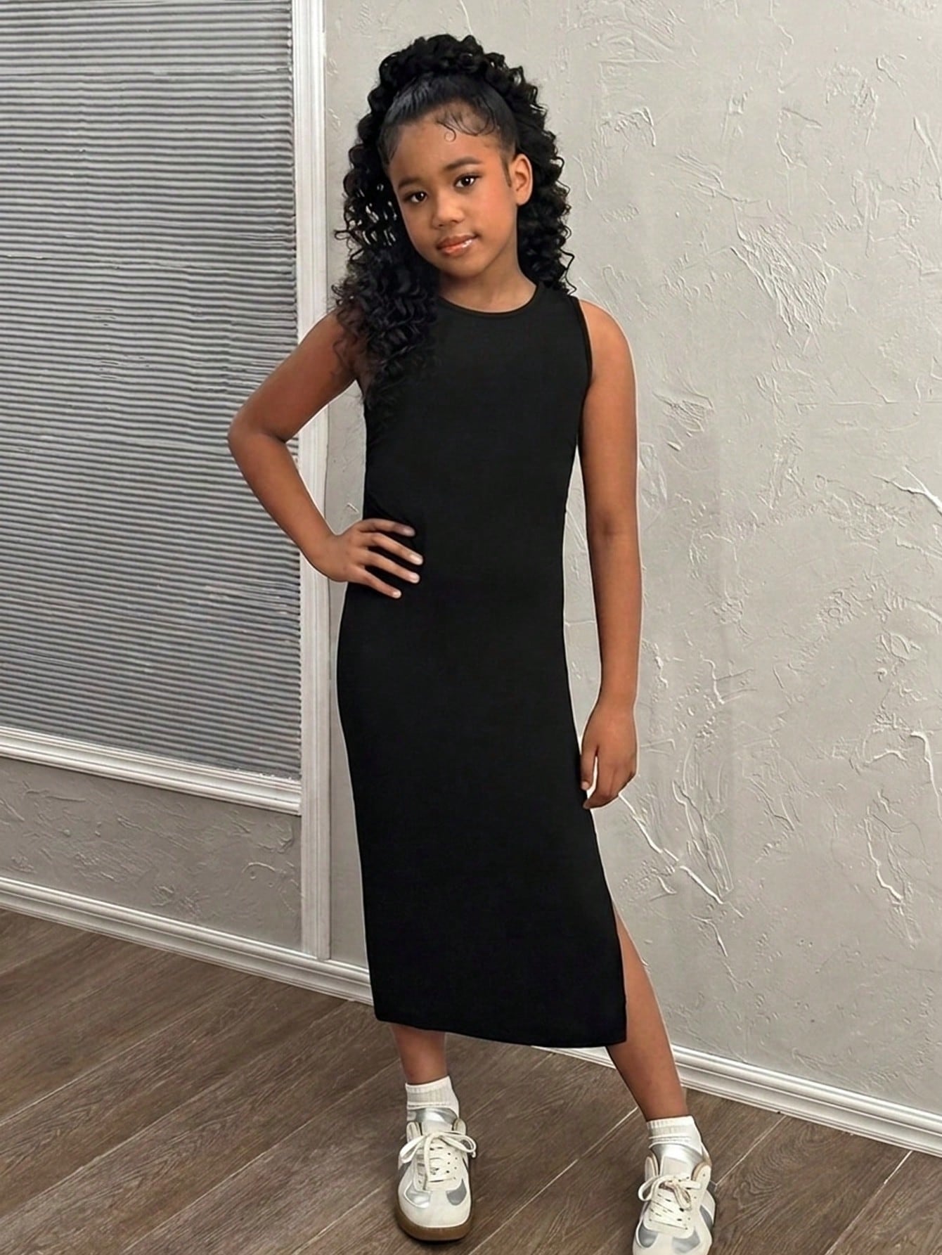 Tween girls sleeveless midi tank dress with round neck, graphic pattern, slim fit waist, slit hem, and apricot color styling for casual and occasion wear.