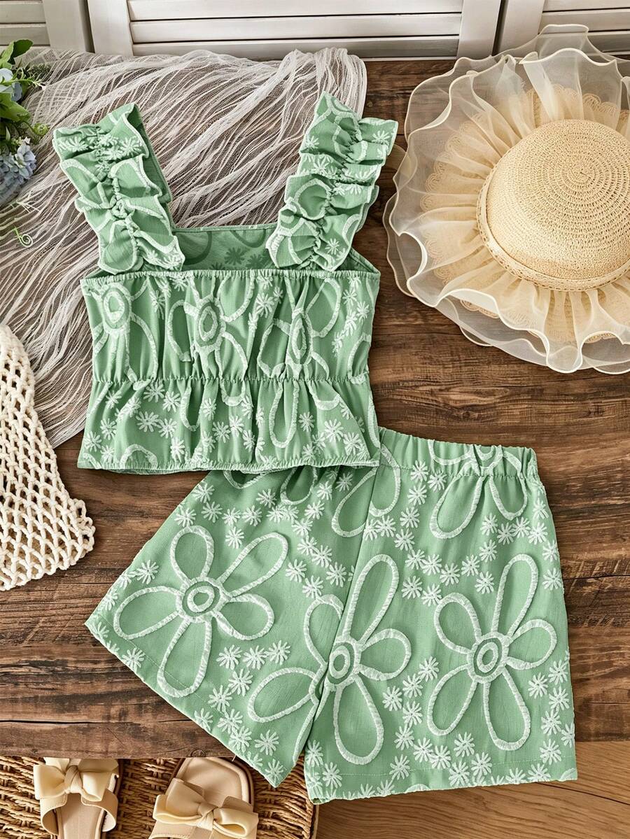 Apricot two-piece summer outfit for tween girls featuring a sleeveless pleated square-neck camisole top with button details and matching gathered shorts.