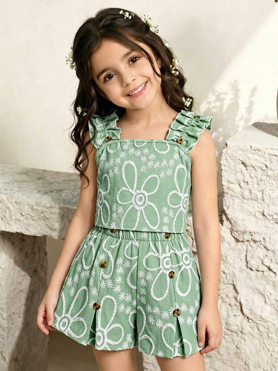 Apricot two-piece summer outfit for tween girls featuring a sleeveless pleated square-neck camisole top with button details and matching gathered shorts.