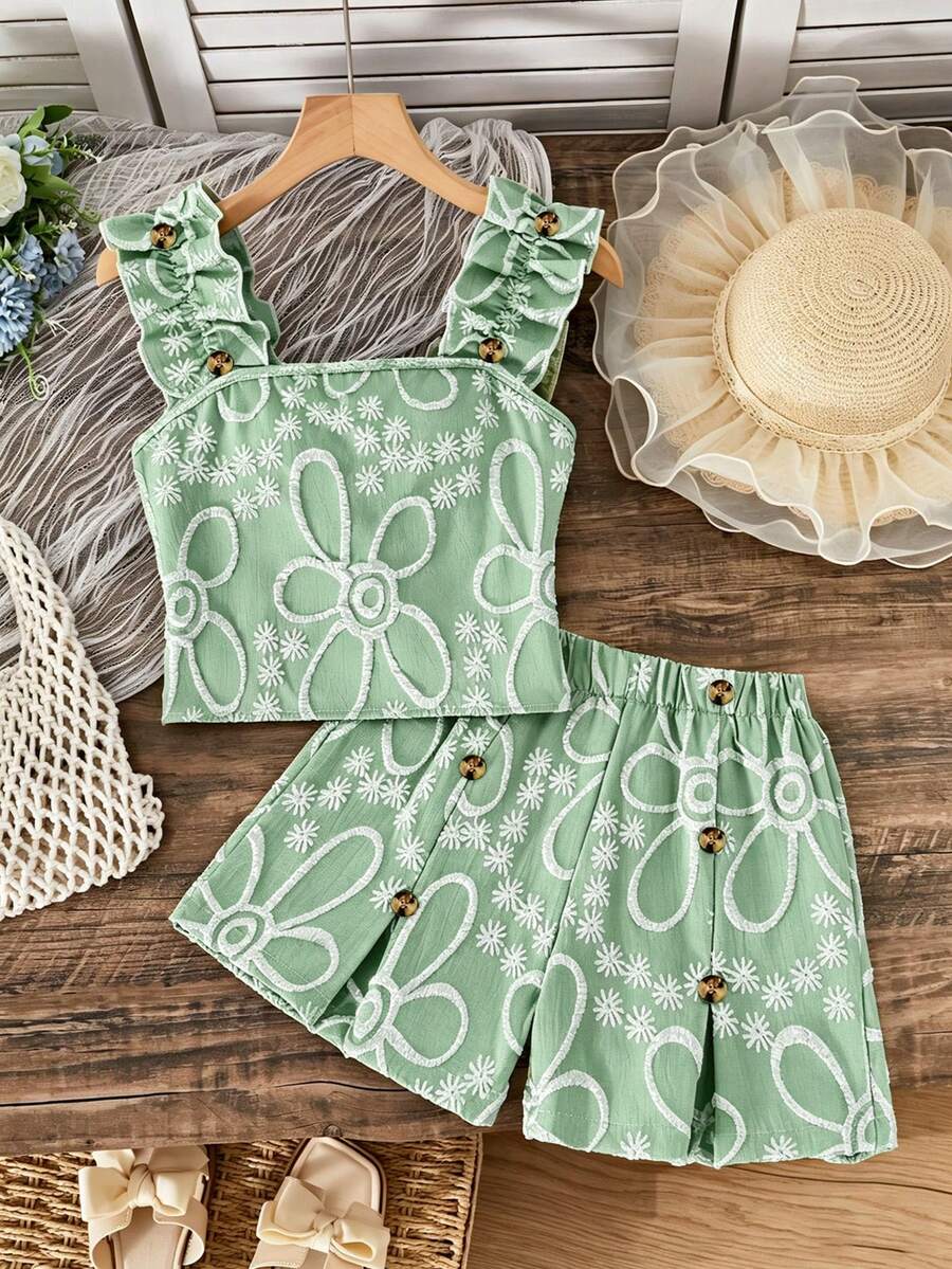 Apricot two-piece summer outfit for tween girls featuring a sleeveless pleated square-neck camisole top with button details and matching gathered shorts.