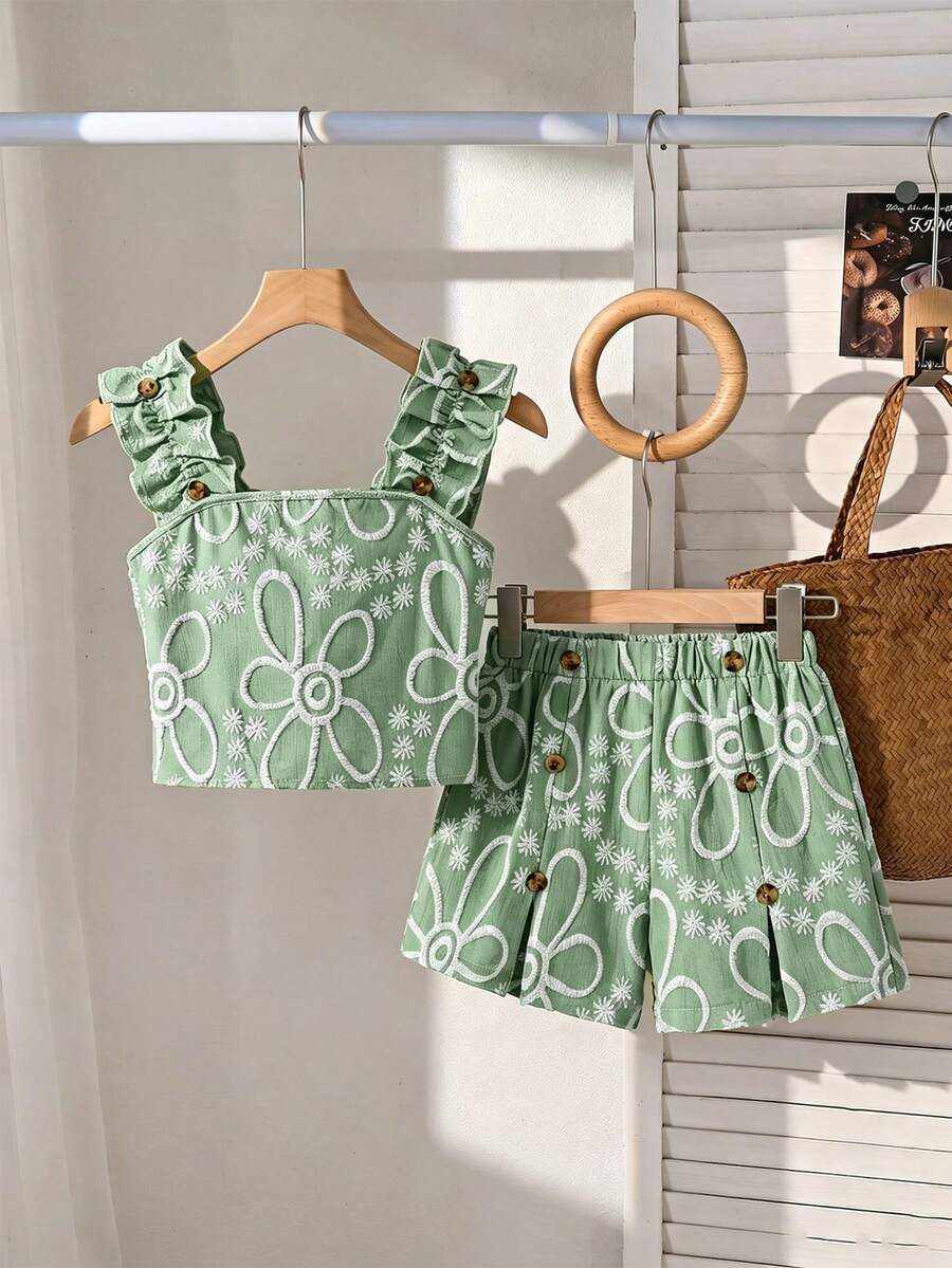 Apricot two-piece summer outfit for tween girls featuring a sleeveless pleated square-neck camisole top with button details and matching gathered shorts.