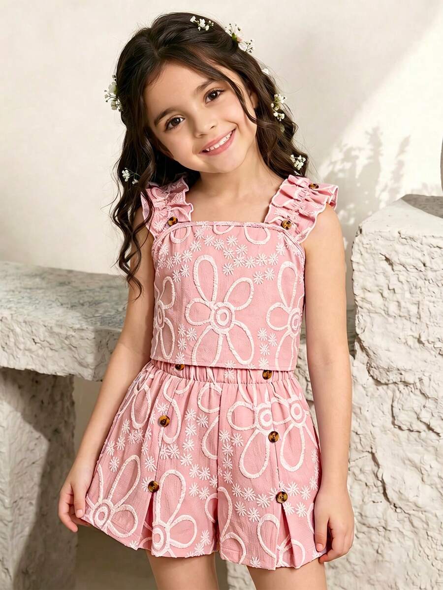 Apricot two-piece summer outfit for tween girls featuring a sleeveless pleated square-neck camisole top with button details and matching gathered shorts.