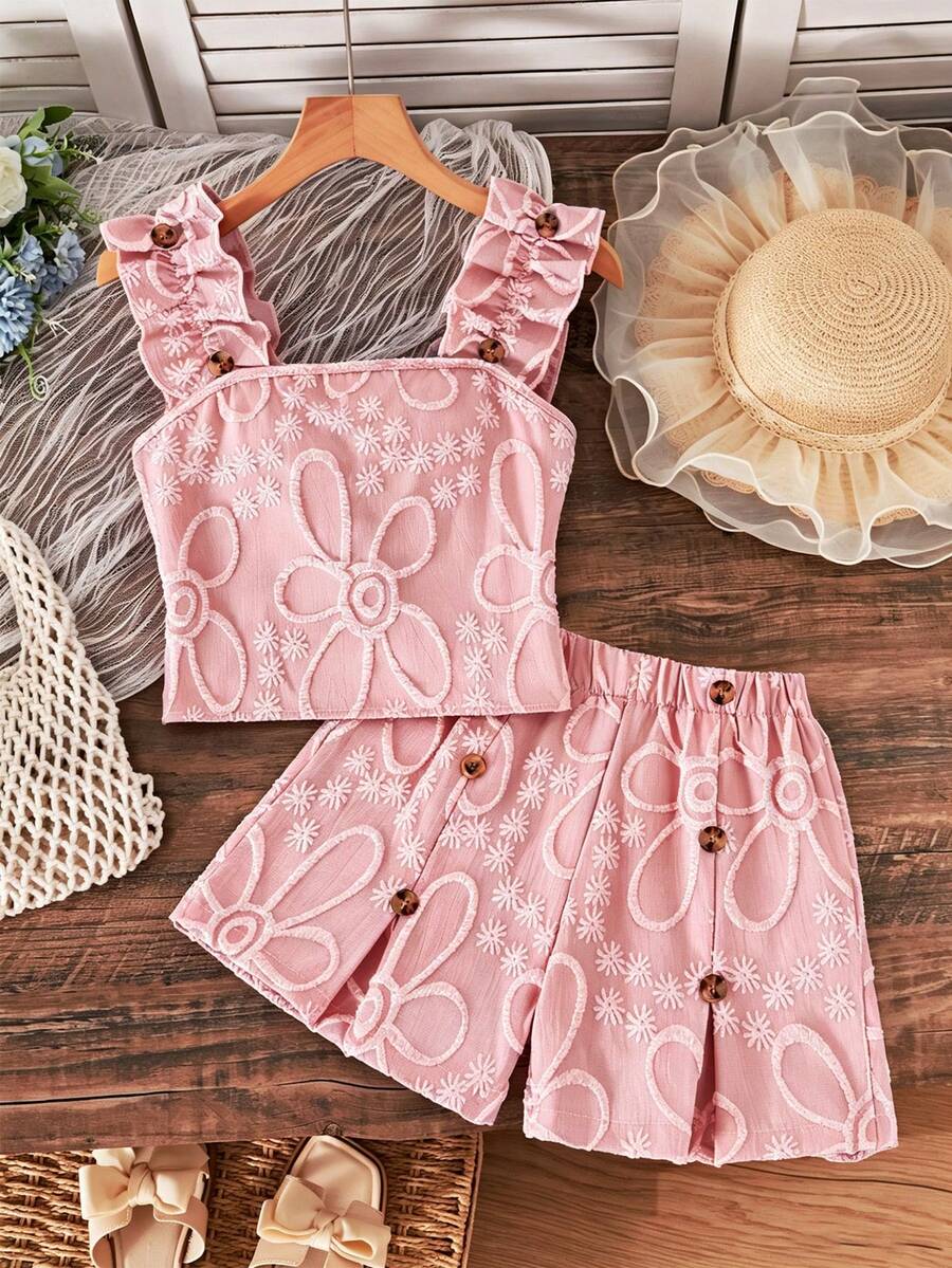 Apricot two-piece summer outfit for tween girls featuring a sleeveless pleated square-neck camisole top with button details and matching gathered shorts.