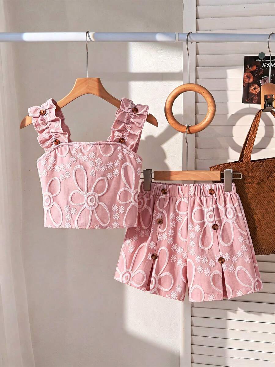 Apricot two-piece summer outfit for tween girls featuring a sleeveless pleated square-neck camisole top with button details and matching gathered shorts.