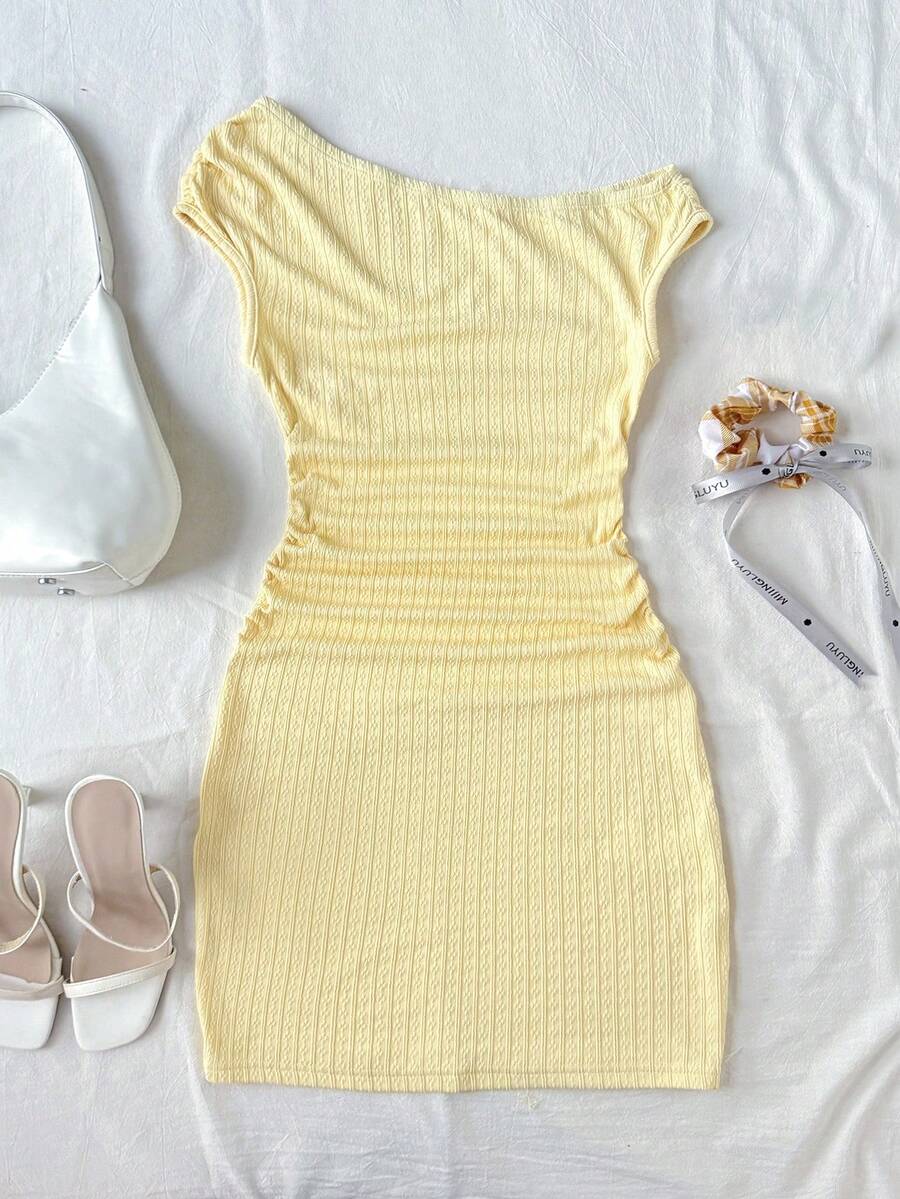 Yellow asymmetrical neck slim fit dress for tween girls with sleeveless design, plain textured knit fabric, natural waist, and pencil hem