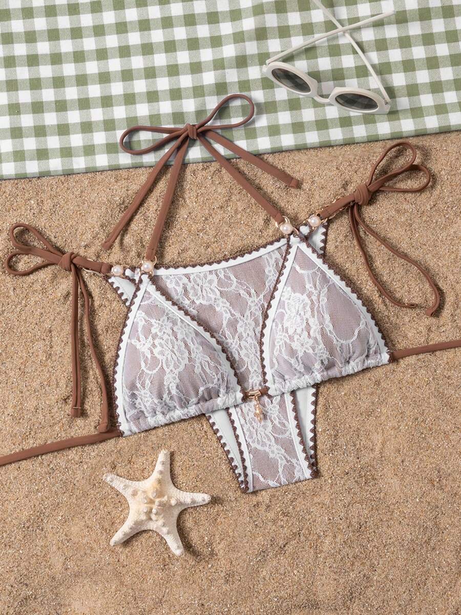 Women's triangle bikini set with contrast lace wireless bra top and ultra high waist tie side bottoms.