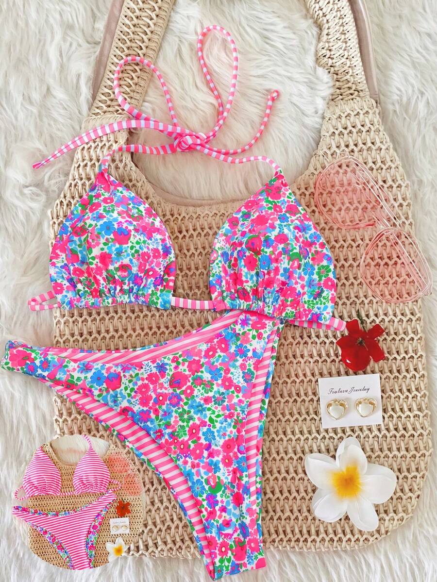 Women's two-piece halter bikini set featuring high cut thong bottoms and removable padding