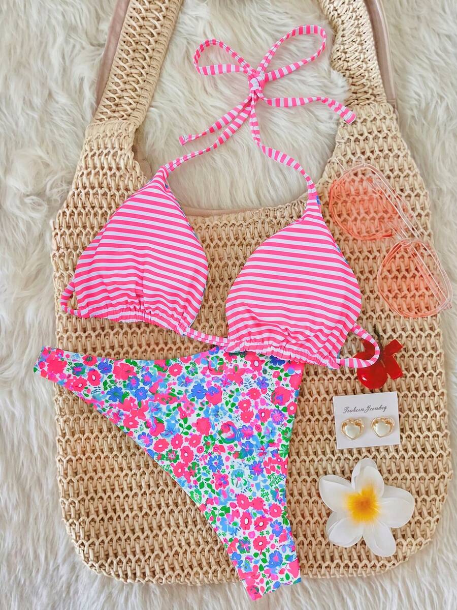 Women's two-piece halter bikini set featuring high cut thong bottoms and removable padding