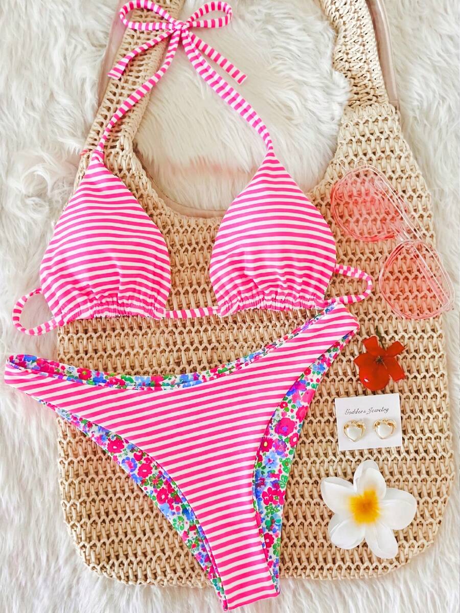 Women's two-piece halter bikini set featuring high cut thong bottoms and removable padding