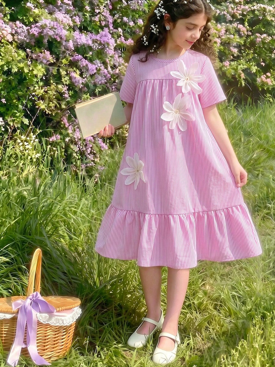 Tween girl wearing an Army Green textured short sleeve smock midi dress with round neck and ruffle flounce hem.
