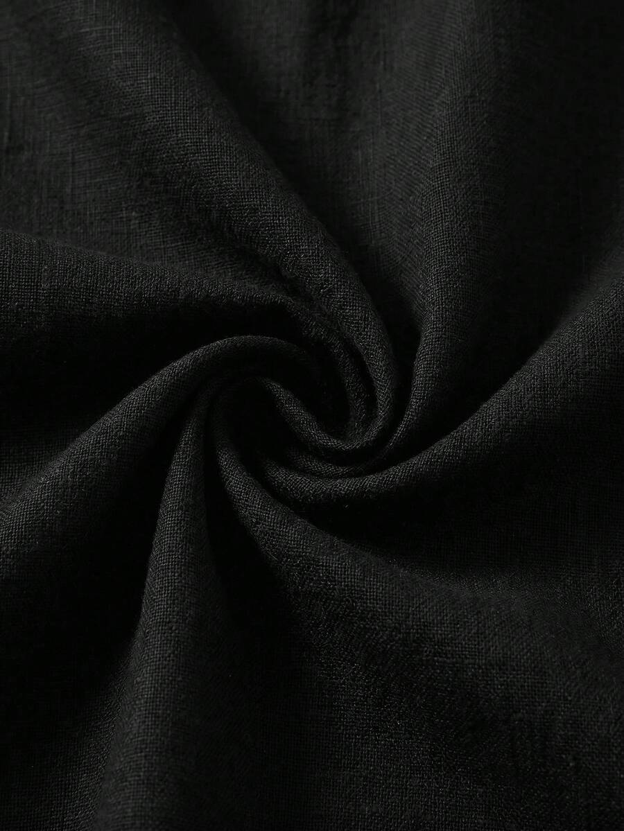 Tween girls casual black A-line long dress featuring short sleeves, a round neckline, and a decorative front bow with contrast lace trim.