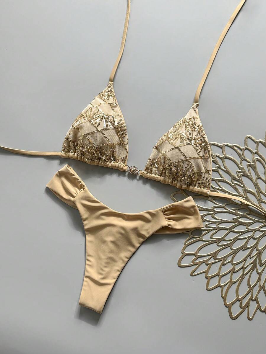 Women's 2-piece triangle cup bikini set in solid color featuring woven pearl shell decoration, halter neckline, and high-waist side-tie ruched bottoms.