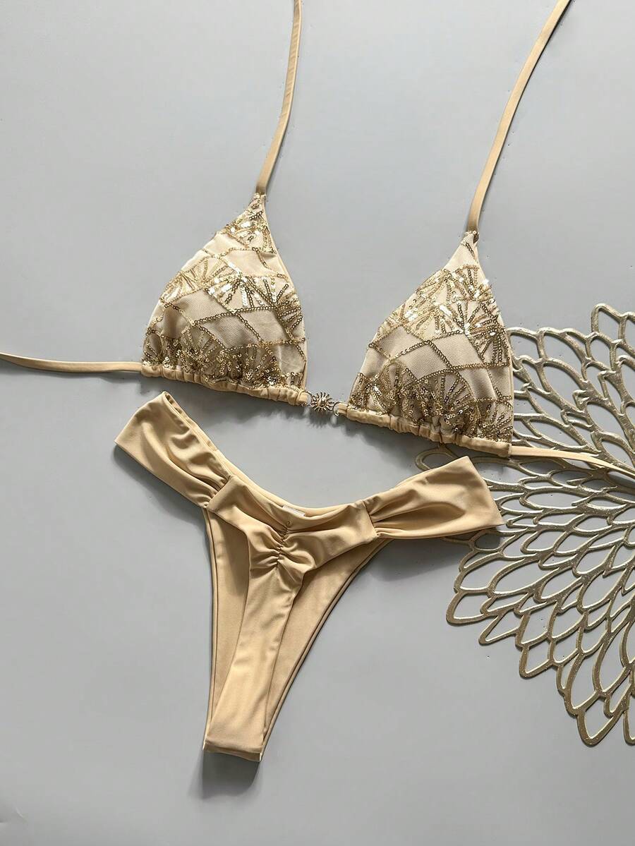 Women's 2-piece triangle cup bikini set in solid color featuring woven pearl shell decoration, halter neckline, and high-waist side-tie ruched bottoms.