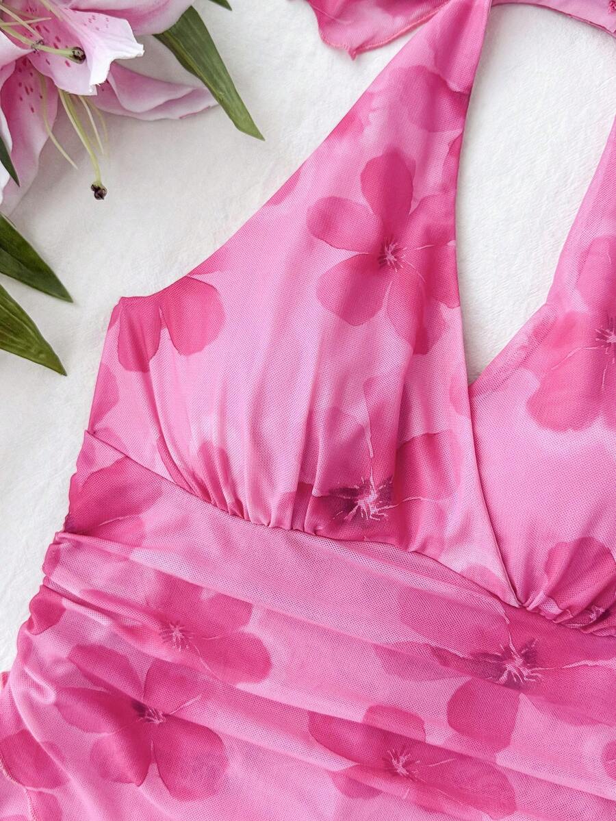 Hot pink tween girls floral print halter dress with sleeveless cami design, high waist, asymmetrical hem, and short slim fit for summer vacation wear
