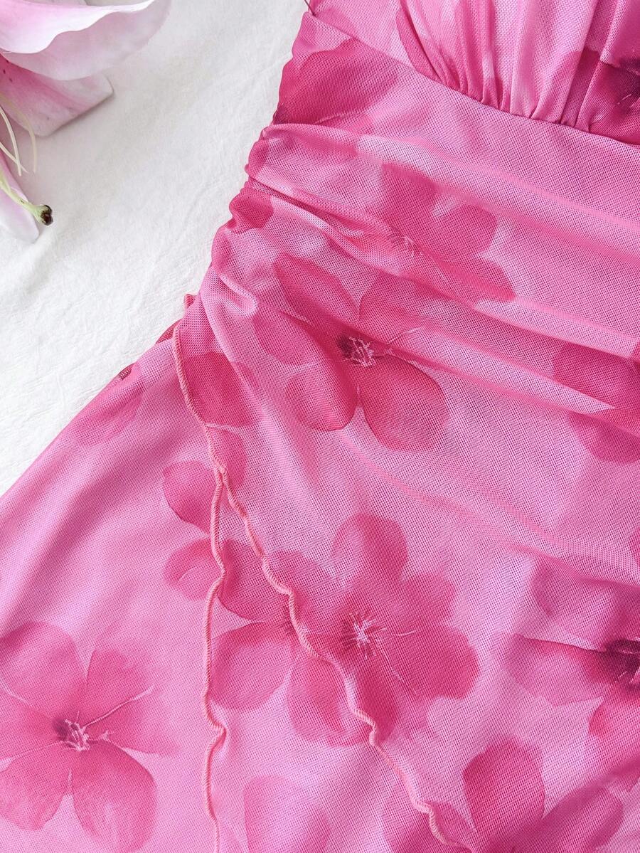 Hot pink tween girls floral print halter dress with sleeveless cami design, high waist, asymmetrical hem, and short slim fit for summer vacation wear