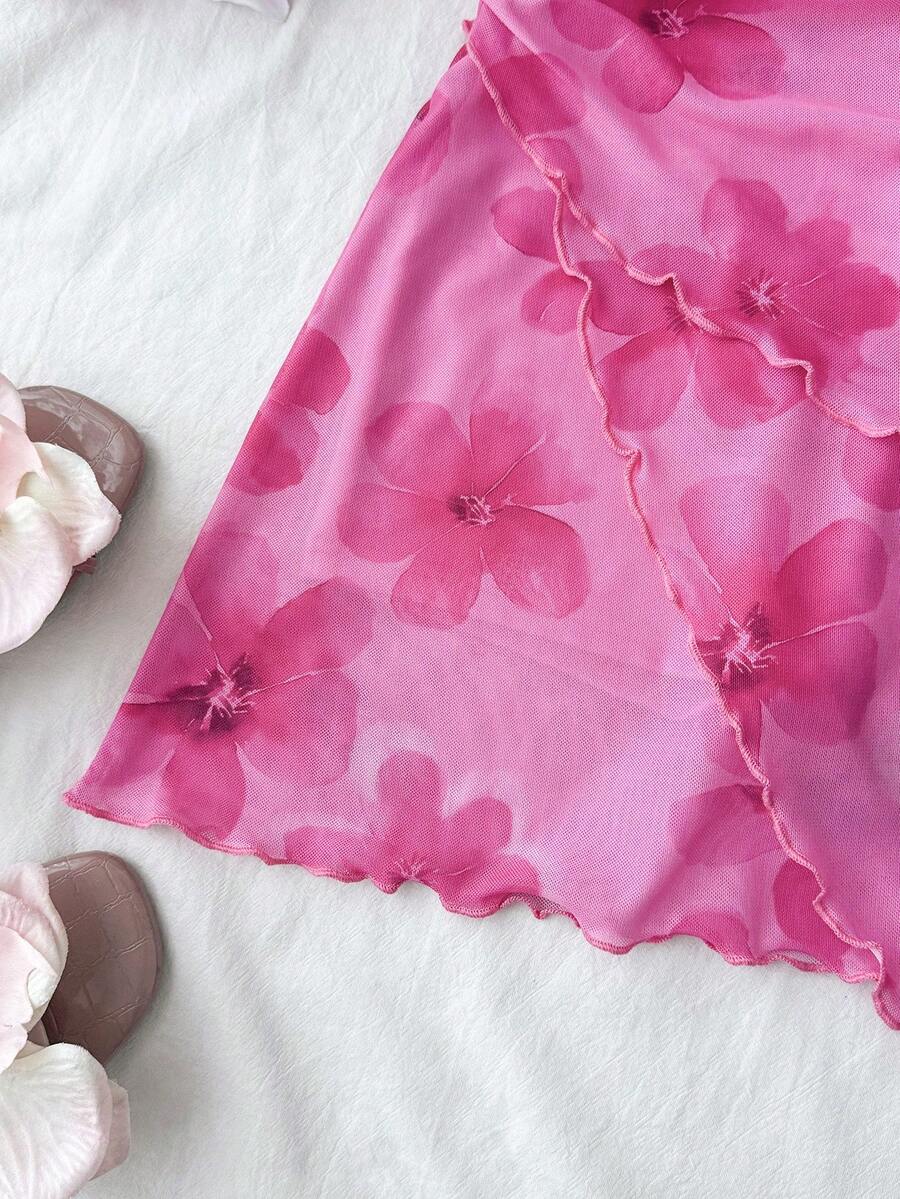 Hot pink tween girls floral print halter dress with sleeveless cami design, high waist, asymmetrical hem, and short slim fit for summer vacation wear