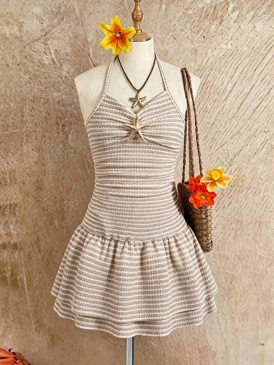 Tween girls apricot sleeveless halter mini dress with textured starfish and shell decor, shirred tiered layer, high waist, and flounce hem.