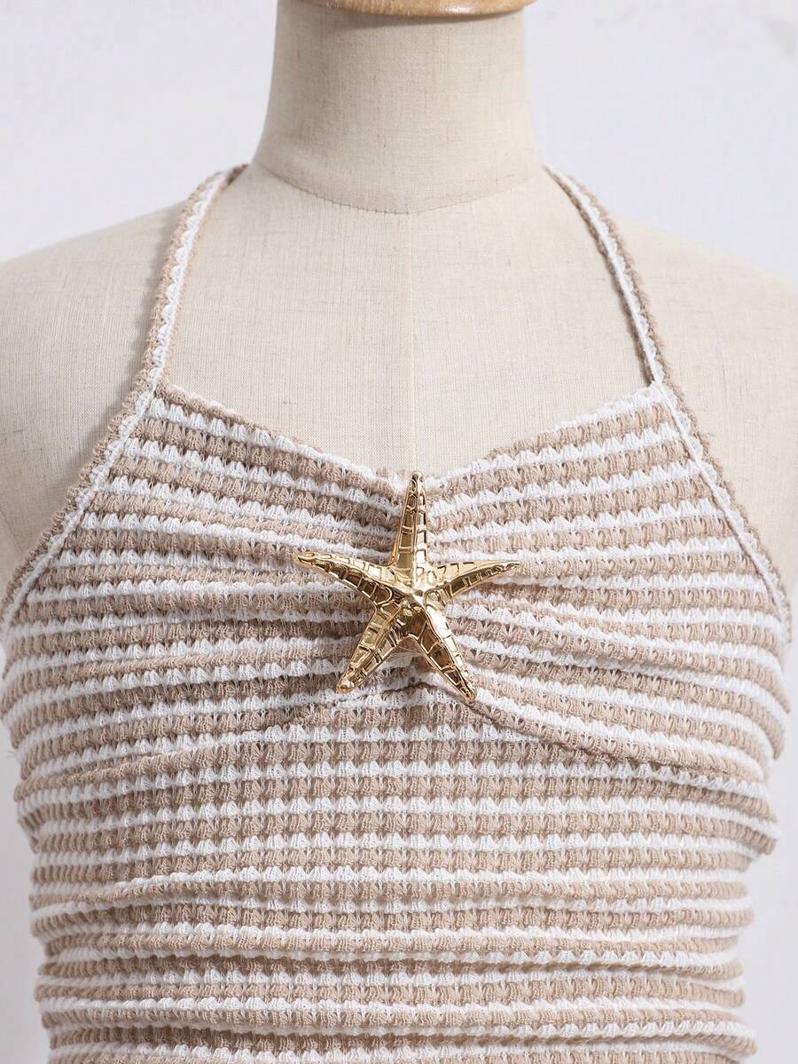 Tween girls apricot sleeveless halter mini dress with textured starfish and shell decor, shirred tiered layer, high waist, and flounce hem.