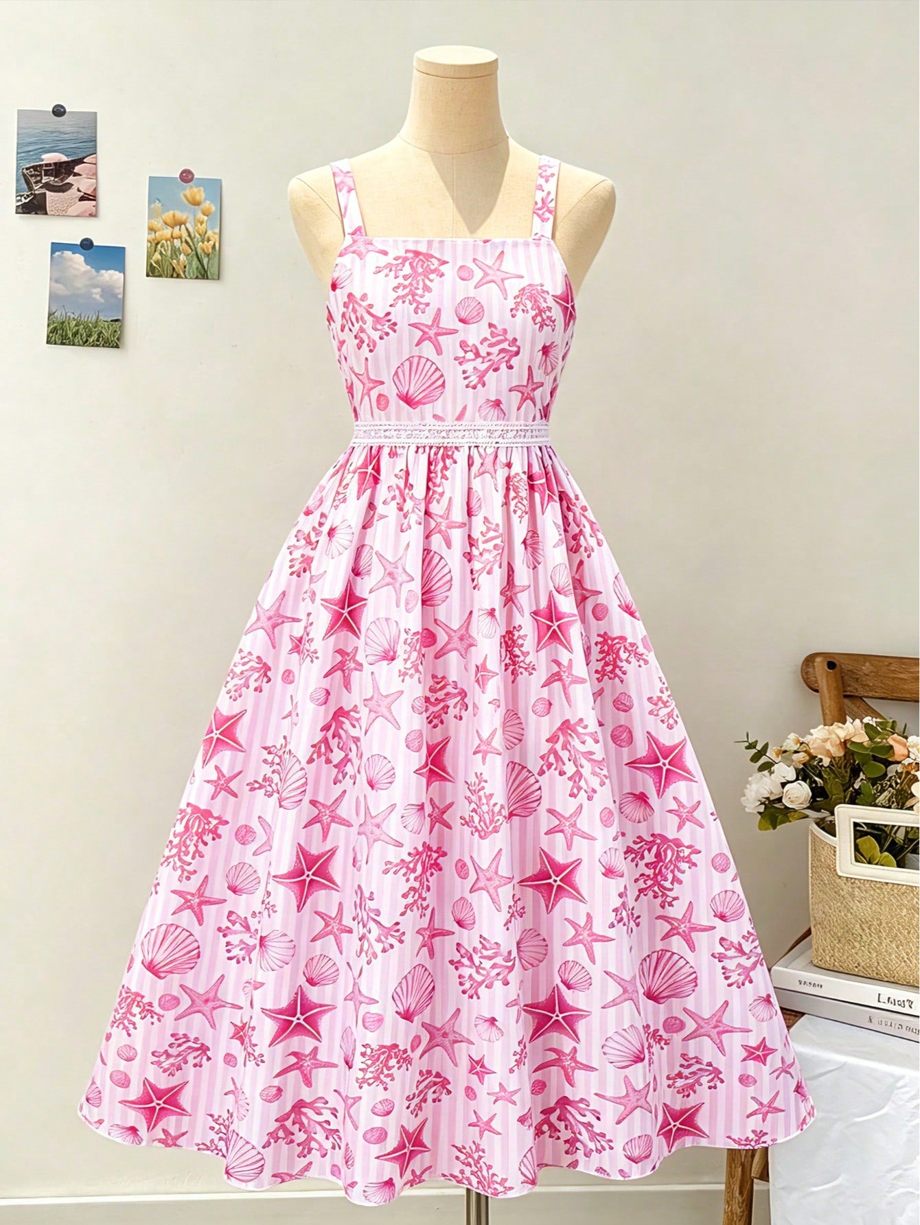 Girls spaghetti strap A-line midi dress with floral and marine-inspired vacation print, lace trim, high waist, and flared hem