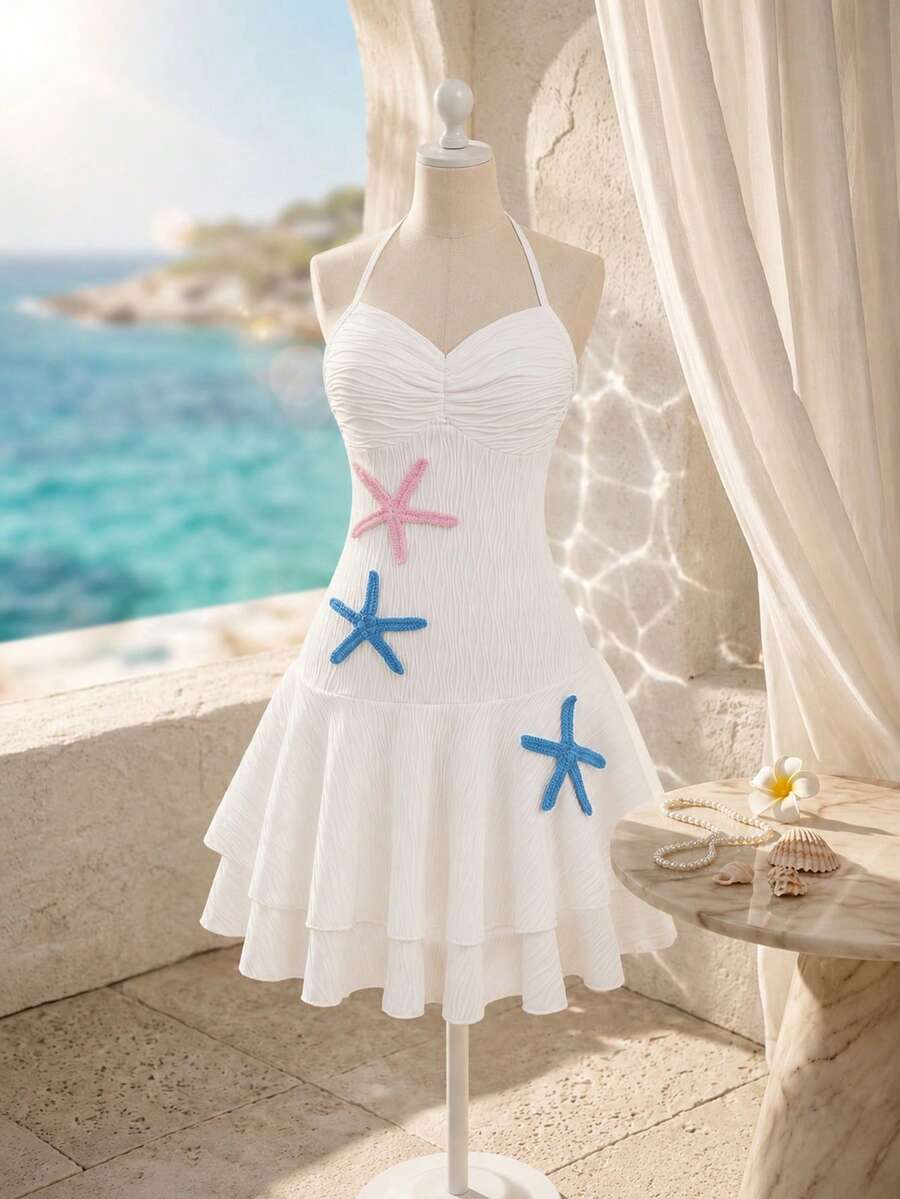 Tween girls apricot sleeveless halter mini dress with textured starfish and shell decor, shirred tiered layer, high waist, and flounce hem.