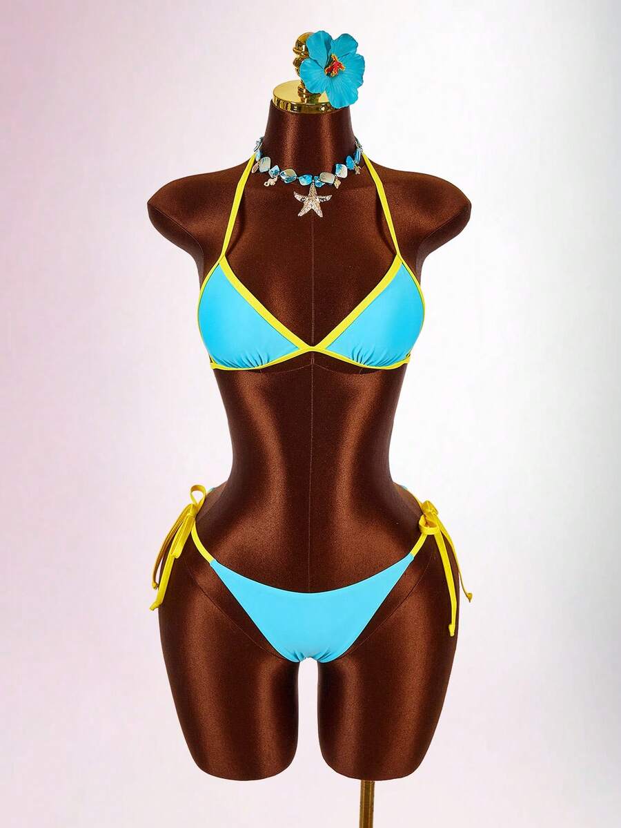 Blue 3-piece women's swimwear set featuring a 3D rose detailed triangle top with cutout tie closure and matching tie-side thong bottom.