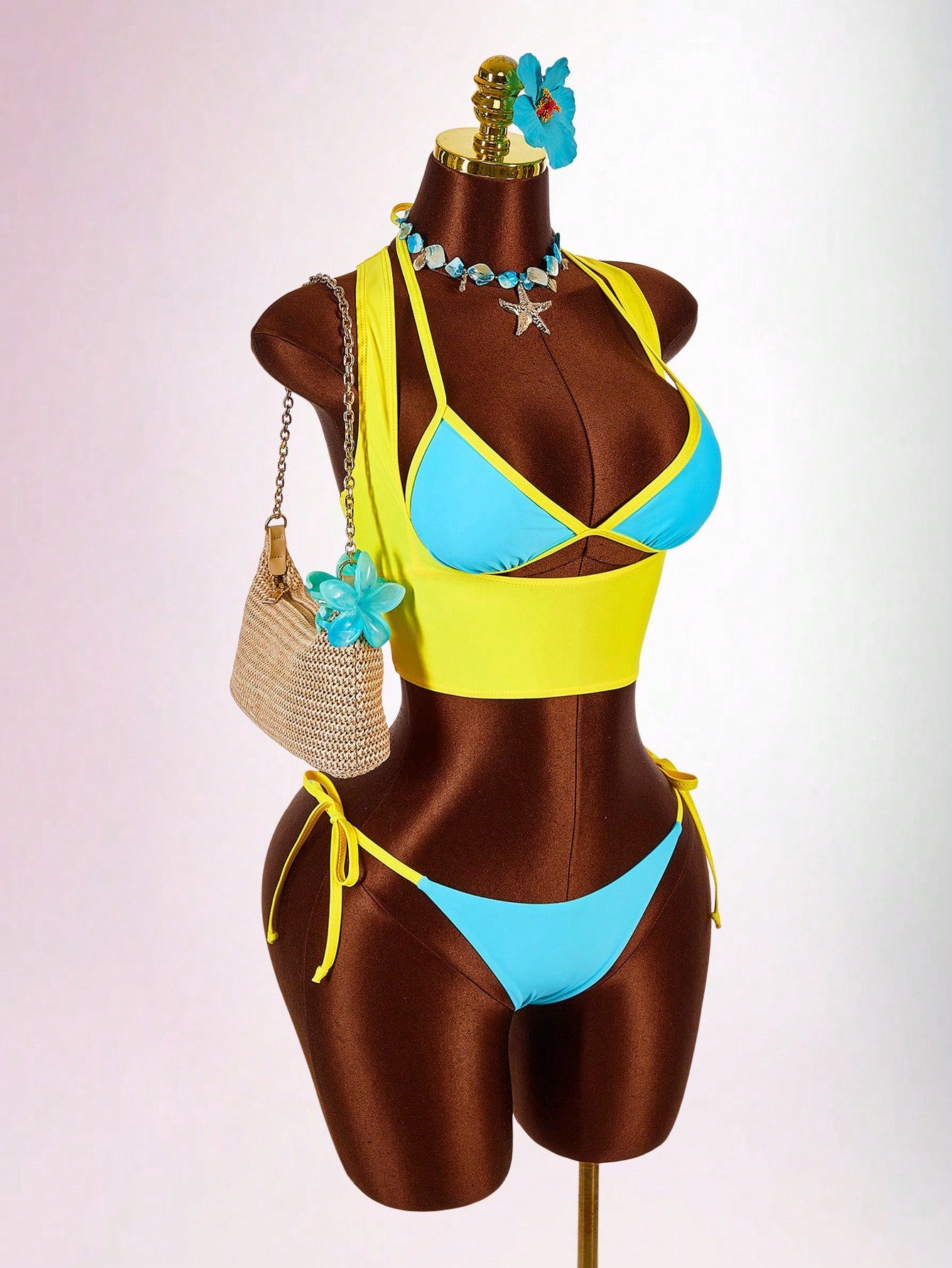 Blue 3-piece women's swimwear set featuring a 3D rose detailed triangle top with cutout tie closure and matching tie-side thong bottom.
