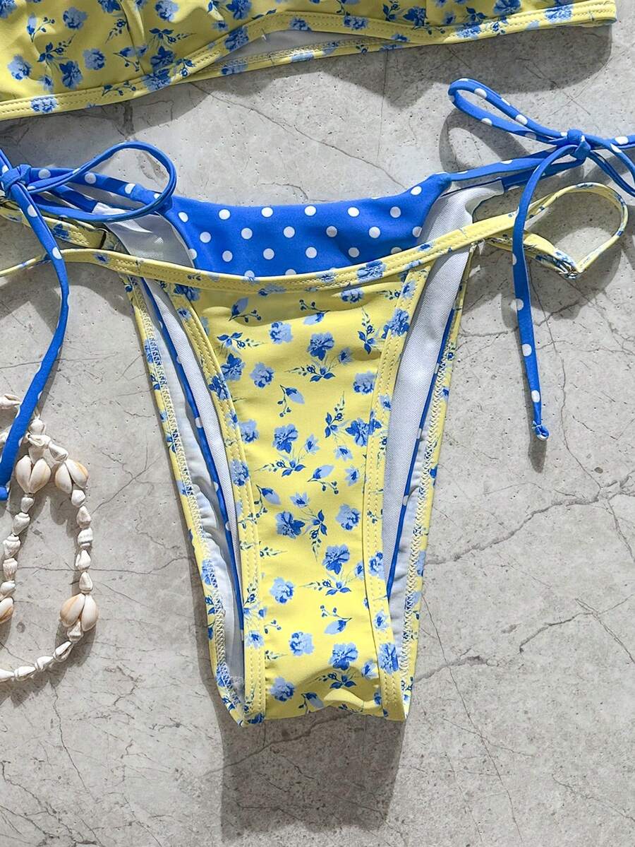 Women's retro polka dot high waist bikini swimsuit set with spaghetti straps and knot tie-back top.