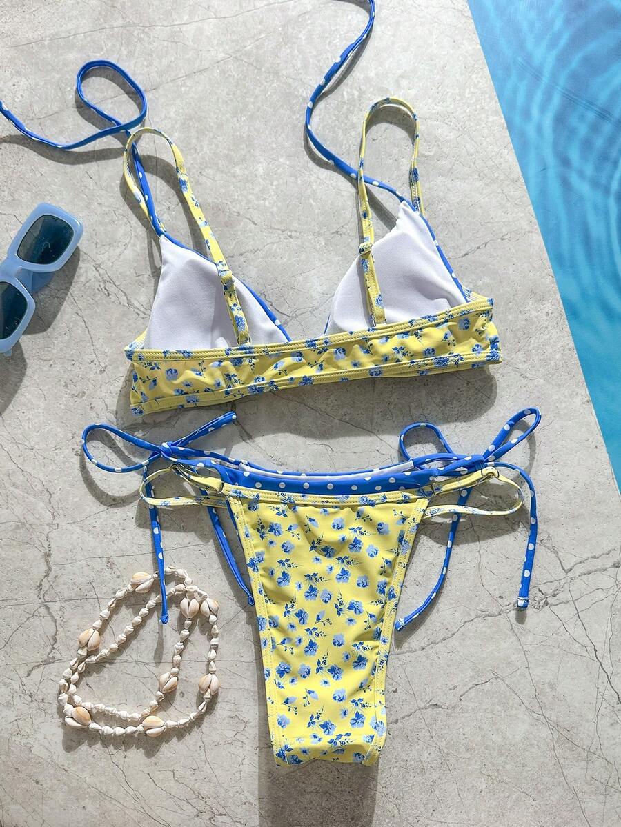 Women's retro polka dot high waist bikini swimsuit set with spaghetti straps and knot tie-back top.