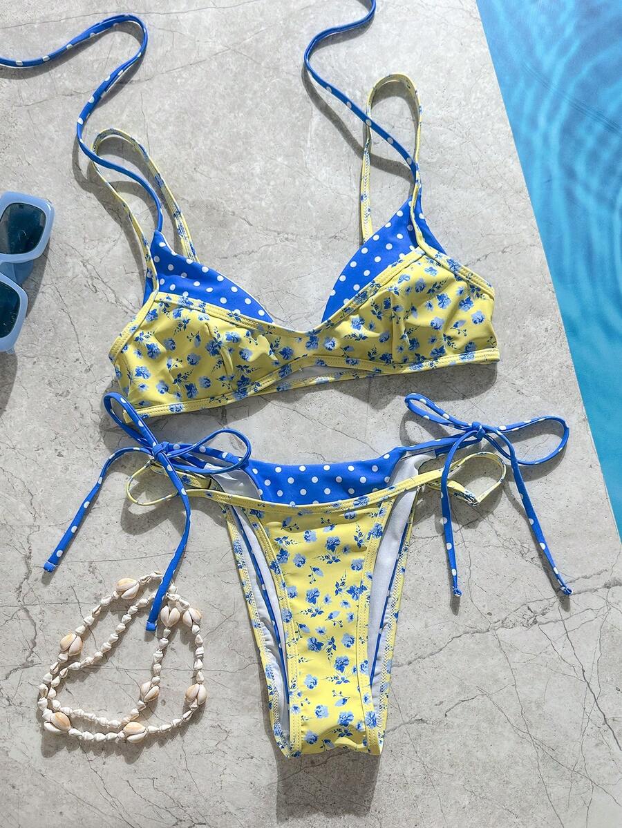 Women's retro polka dot high waist bikini swimsuit set with spaghetti straps and knot tie-back top.