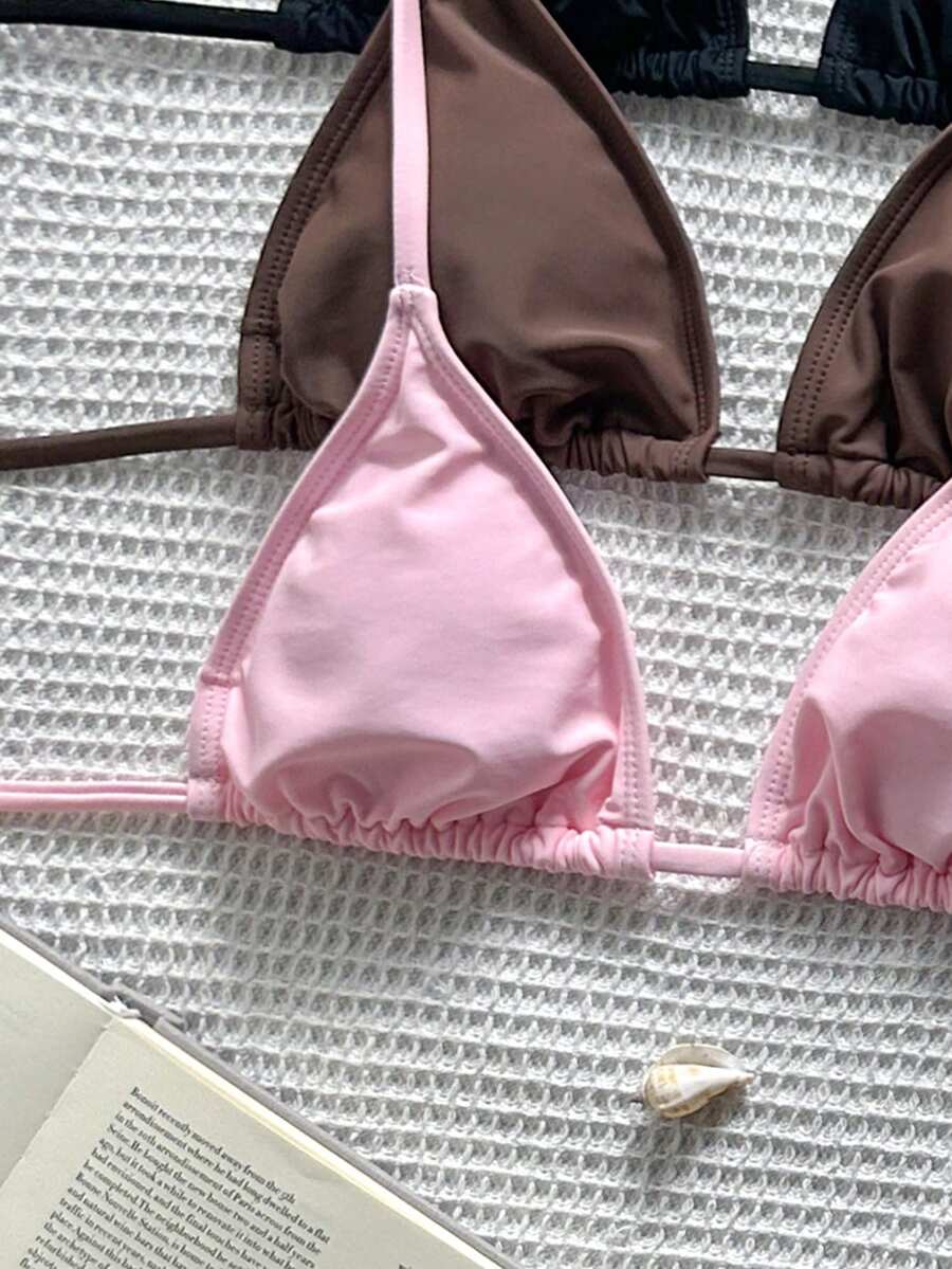 Women's high waist halter tie bikini swimwear set featuring triangle cups, wireless bra with removable padding, and tie side bottoms.