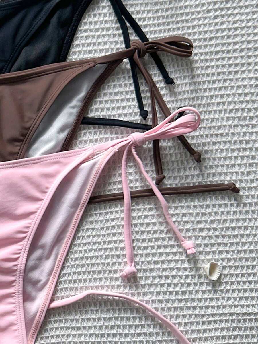 Women's high waist halter tie bikini swimwear set featuring triangle cups, wireless bra with removable padding, and tie side bottoms.