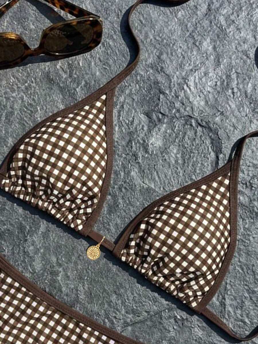 Women's high waist 2-piece triangle bikini set featuring colorblock trim, halter neckline, wireless bra with removable padding, and tie-side bottoms.