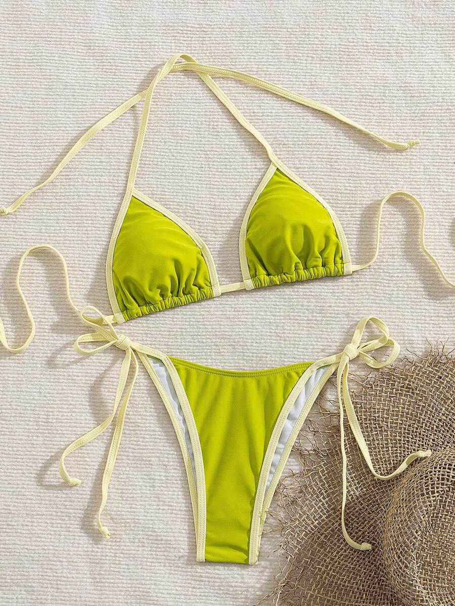 Women's two-piece halter triangle bikini set featuring a backless tie-back top with removable padding and matching tie-side mid-waist bottoms.