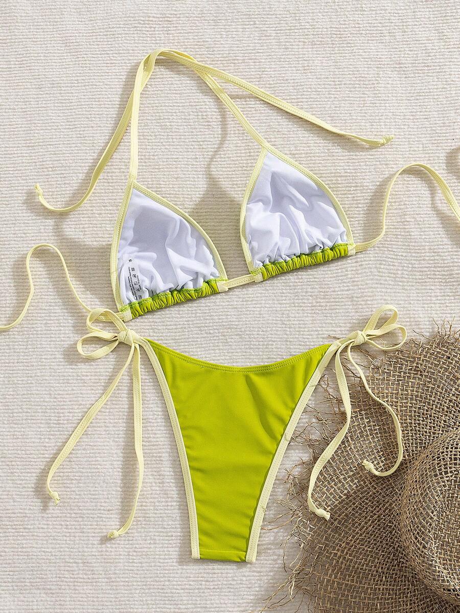 Women's two-piece halter triangle bikini set featuring a backless tie-back top with removable padding and matching tie-side mid-waist bottoms.