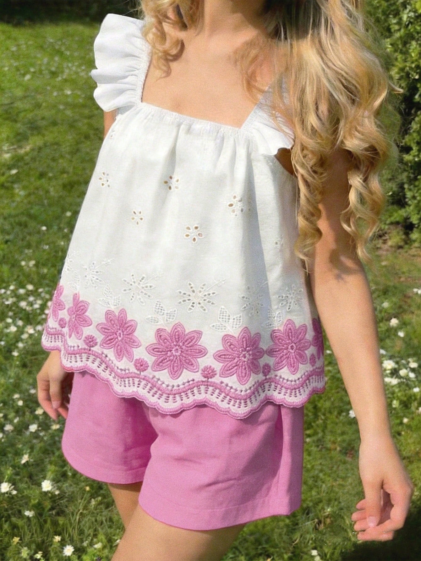 Tween girls 2-piece bohemian outfit set in apricot featuring a square neck embroidered sleeveless camisole top and matching floral wide leg shorts.