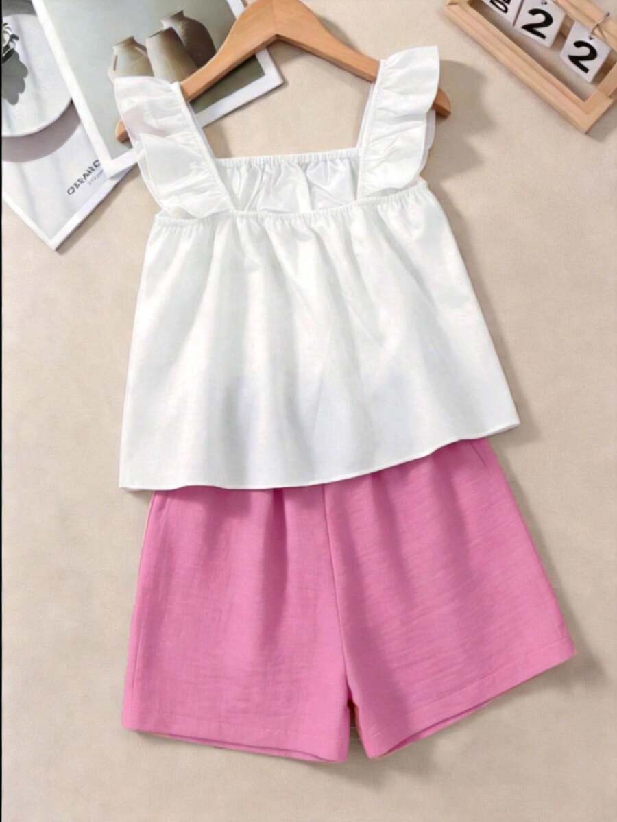 Tween girls 2-piece bohemian outfit set in apricot featuring a square neck embroidered sleeveless camisole top and matching floral wide leg shorts.
