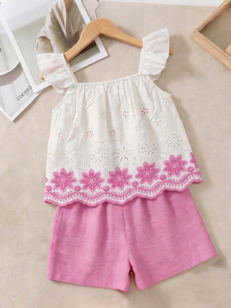 Tween girls 2-piece bohemian outfit set in apricot featuring a square neck embroidered sleeveless camisole top and matching floral wide leg shorts.